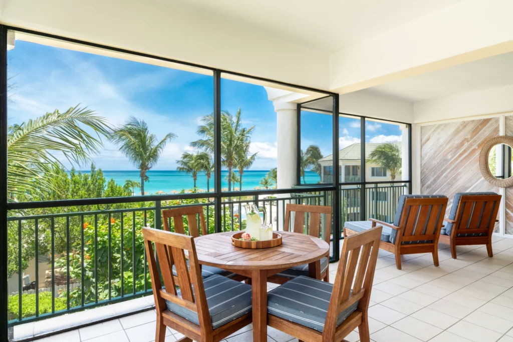 Sands - 2-bedroom ocean front suite, screen-in balcony, teak dining table and chairs, 0039