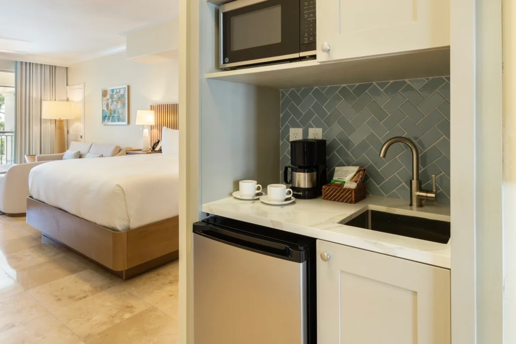 Sands - junior suites kitchenette, mini fridge and microwave, coffee machine, bar sink, plateware, glassware 9869