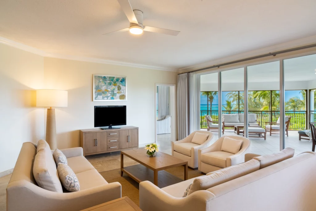 Sands - ocean front deluxe one bedroom, living room, screened-in wrap around balcony, two sofa sleeper, TV coffee table 0151